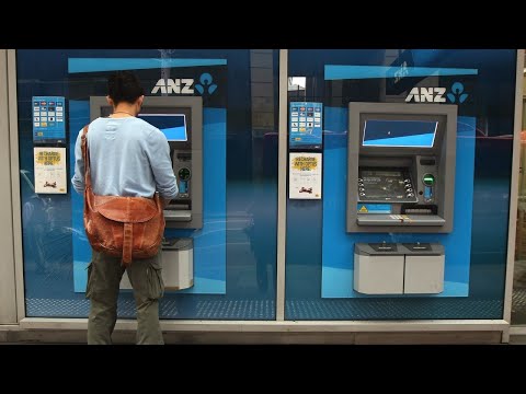 ANZ records 60 per cent slide in half-year cash profit