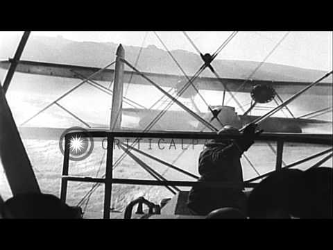 US Navy's three flying boats taxi and take off from a water body, and in formatio...HD Stock Footage