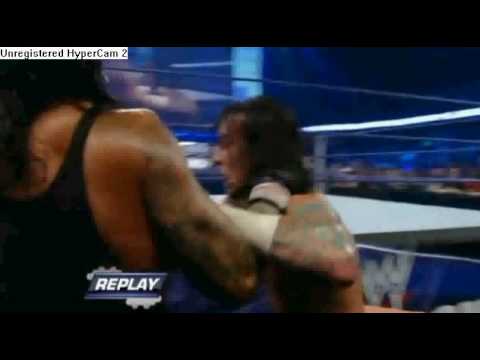 Undertaker returns and destroy CM-PUNK !