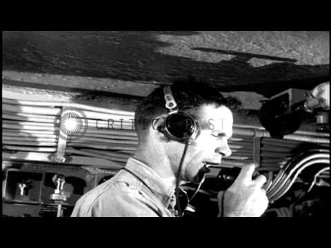 A turret Captain gives orders to load and fire guns while aboard USS Missouri HD Stock Footage