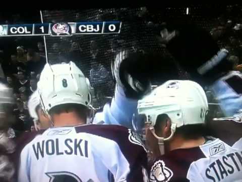 Wolski Kisses Stastny on the Neck After Scoring
