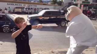 preview picture of video 'Our son Gabe dancing with Dr Simi (mascot for a pharmacy) on the street corner in Jalapa, Guatemala.'