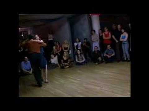  Rebecca Shulman  and  Eric Jorissen  are  dancing  to  a  milonga