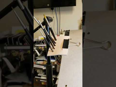 Brush holder for easels and sketchbooks