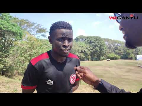 FCB Nyasa Big Bullets goalkeeper Richard Chimbamba talks to Wa Ganyu