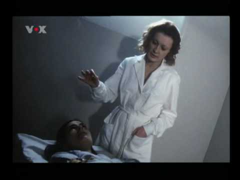 TAG DER IDIOTEN Carole Bouquet in straitjacket