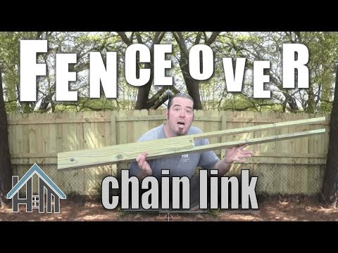 image-Can you replace a chain link fence with wood?