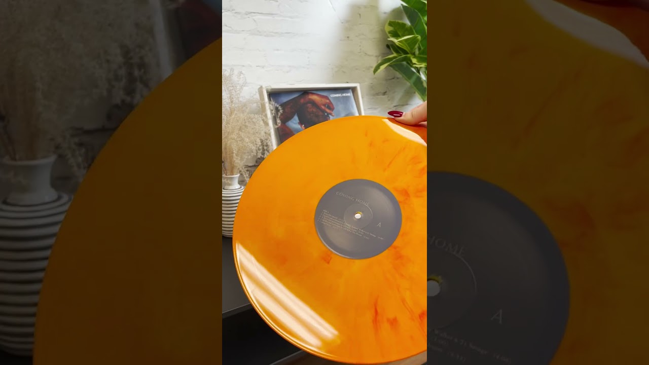 Unboxing Usher's album Coming Home