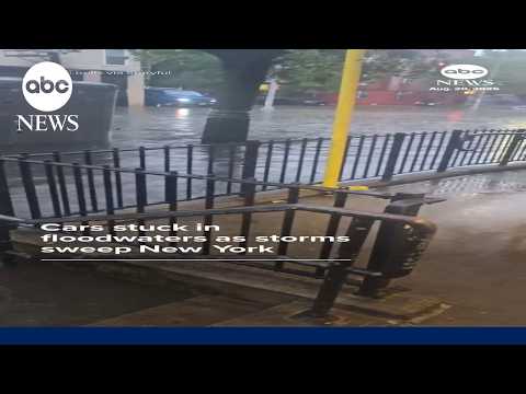 Cars stuck in floodwaters as storms sweep New York