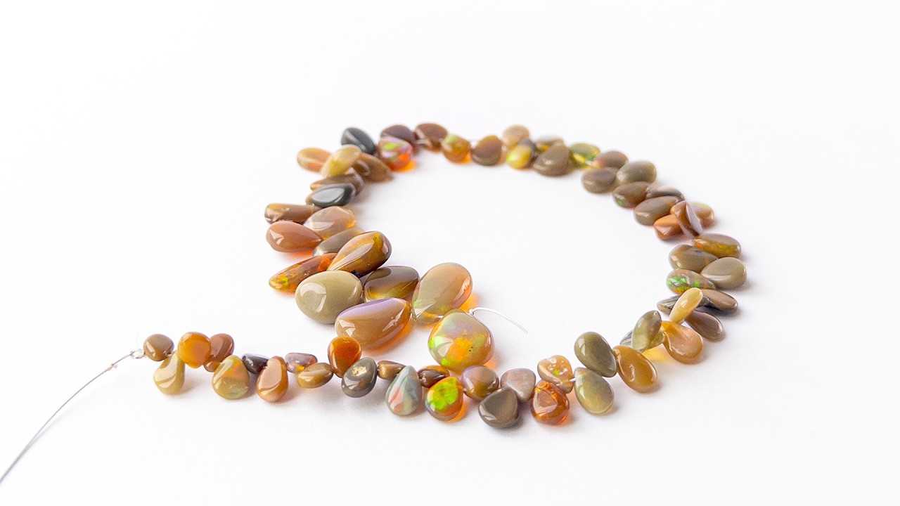 Ethiopian Opal | Smooth Briolette | 4-8mm Bead Size | 22cm Strand Length video