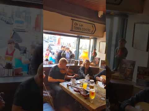 Sean Smyth of Lunasa playing at a session in Galway. Sharon Shannon listening.