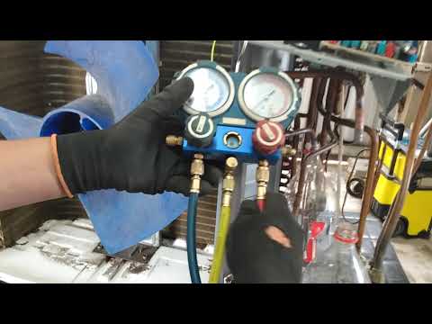 Cleaning the outdoor unit's pipe circuit with R141b.