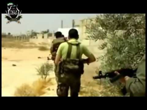 تقدم عناصر كتائب الفاروق الى الخطوط الأولى لحاجز الديابية في القصير في ريف حمص