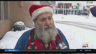 Winchendon's Santa Claus stops for Dunkin as snow falls Friday