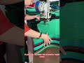 Trabajadora realizando unos cortes en moldes textiles en una maquiladora