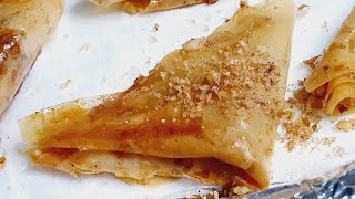 משולשי פילו אגוזים בסירופ קריספיים Nut filo triangles in syrup מטבח בקלי קלות ליהי קרויץ (ליהי קרויץ - מטבח בקלי קלות) - התמונה מוצגת ישירות מתוך אתר האינטרנט יוטיוב. זכויות היוצרים בתמונה שייכות ליוצרה. קישור קרדיט למקור התוכן נמצא בתוך דף הסרטון