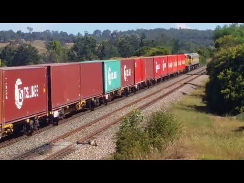 RL310, RL309, 1104 Lead a QUBE Container Train Near Picton