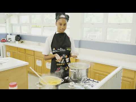 Gregoryann Thomas,Taste of Wadadli Jr Chef presenting her dish Pepperpot Dip with Fungi Chips.