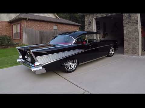 Dad Backs 57 Chevy Out of Garage