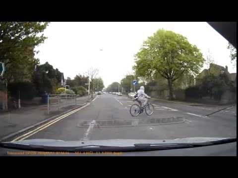 Teenage cyclist goes out into road without looking