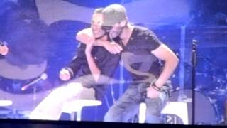 Enrique Iglesias with a gay fan on stage