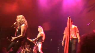 TIGER WOODS ON STAGE WITH Steel Panther