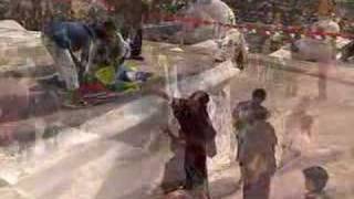 preview picture of video 'LOSAR 2006 at BOUDHANATH - Prayerfags and Katas'
