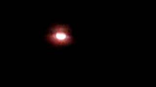 Unidentified Flying Objects sighted...red/orange balls or spheres of light crossing the sky...