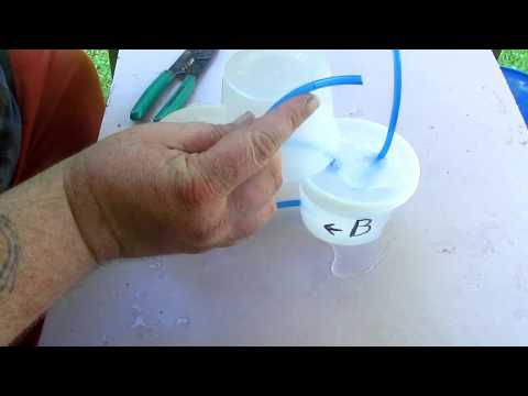 Perpetual motion proof of concept with Herons Fountain Corrected