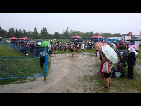 Toronto Afrofest 2013-People dancing in the rain at Woodbine park . Part 3