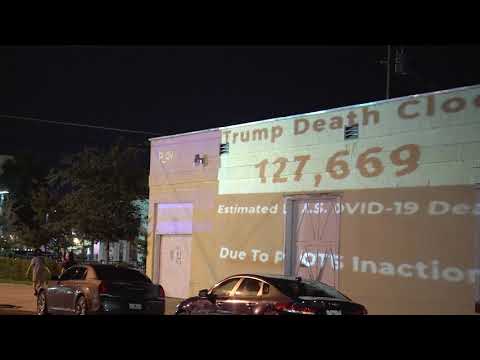 Trump Death Clock and Lightbrush projection mapping guerilla art in Sanford, FL