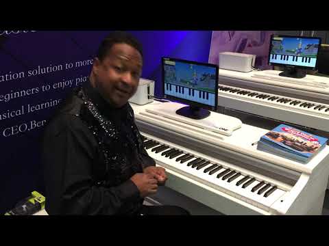 Kris Nicholson demonstrates a digital piano by The One at Namm 2020