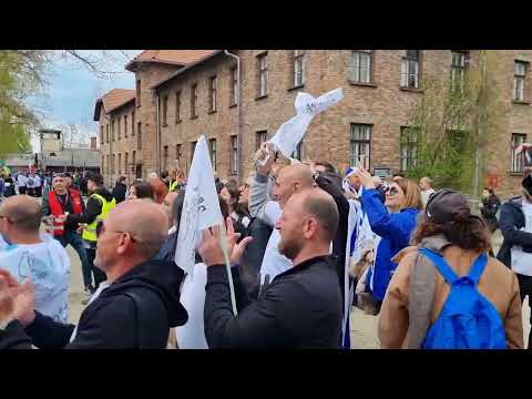 Amazing moment at Auschwitz  as large group of Israeli Jews & Arabs sing together