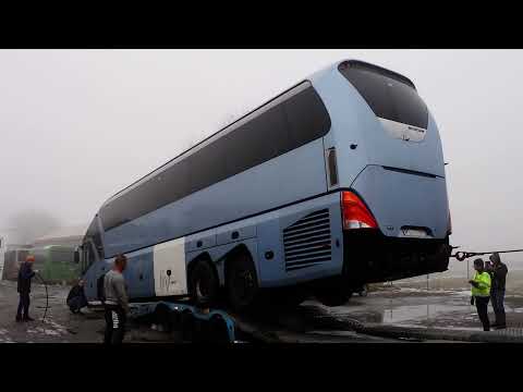 Neoplan Starliner l, loading in semitrailer  FVG , Warszawa -  December 2021. Parts2