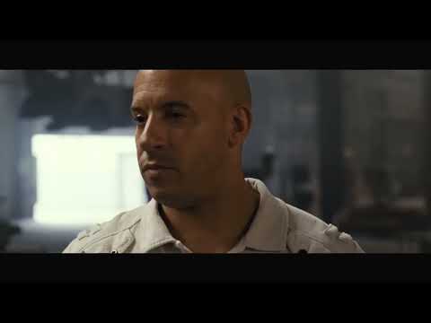 Trailer image of the vault-drag chase through downtown Rio, underscored by pounding score