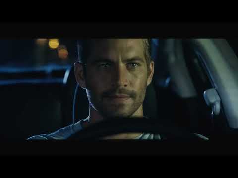 Trailer frame of the Rio rooftop chase echoing percussive score hits