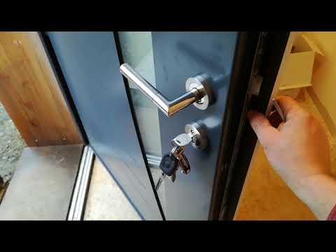 pose menuiserie alu - réglage porte entrée alu