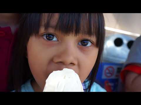 FARRAH IS EATING SOFT ICE CREAM