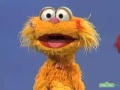 Sesame Street Elmo And Zoe Demonstrate Above And Below