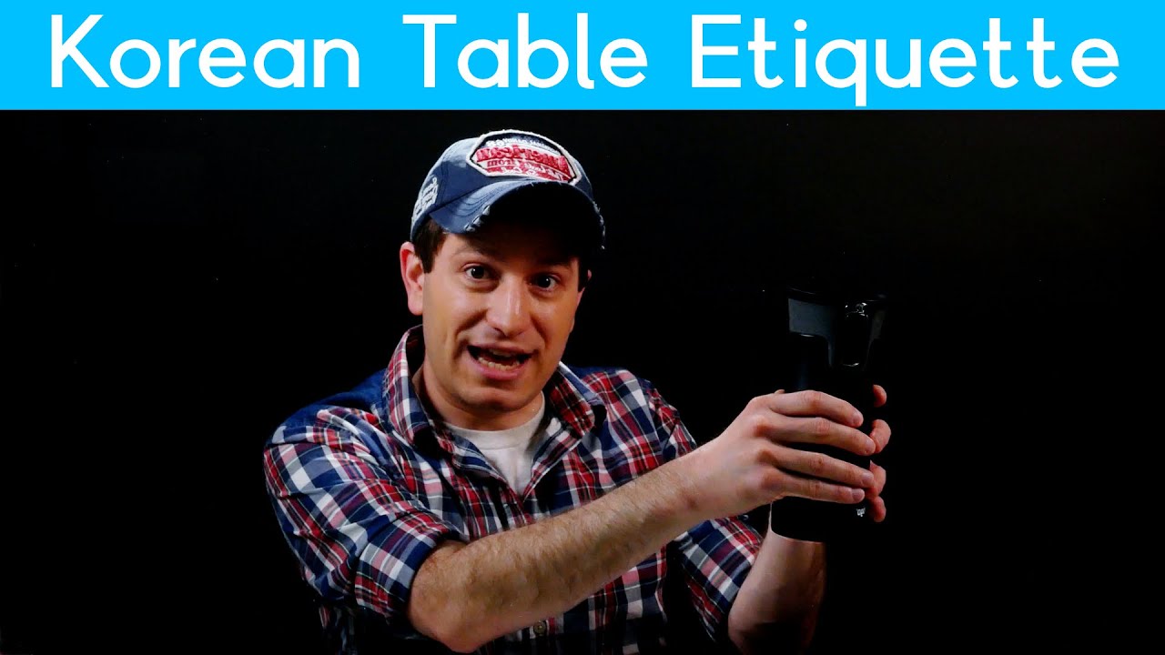 A Korean dining table with proper table manners showing the placement of chopsticks spoon and side dishes for an etiquette demonstration