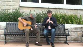 Larry Nuget and Patsy O'Brien perform on Floyd's Bench in Muskegon, MI.