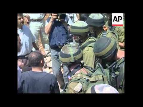 Settler caravans arrive at Nitzanim; Dahlan comments; Palestinian demo