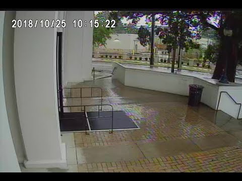 Library surveillance video shows man chasing woman