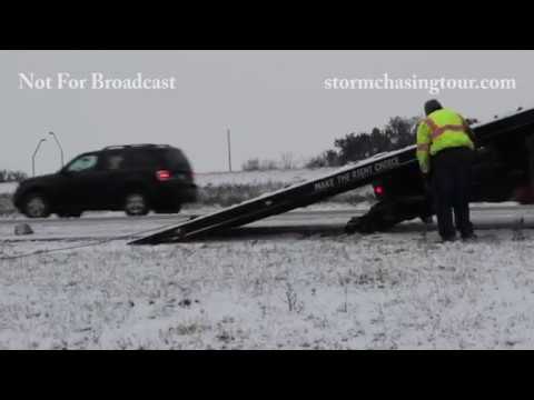 WICHITA, KANSAS - SLICK ROADS CAUSE SLIDE-OFFS AND WRECKS