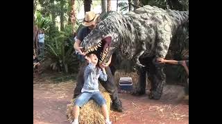 T-rex dinosaur bites girl