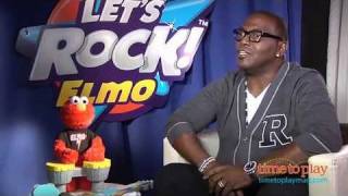 Randy Jackson helps introduce Let's Rock Elmo