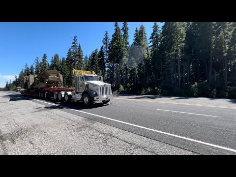 Another 313 CAT and almost hauling a rock crusher