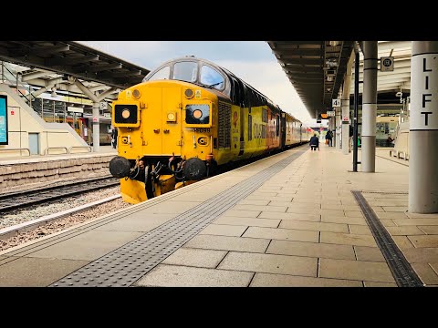 Colas rail class 37 nos 37099 + BR green 37057 depart derby after working from Neville hill to derby