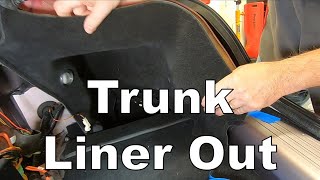 Trunk Right Rear Inner Liner Removal from an Aston Martin DB9