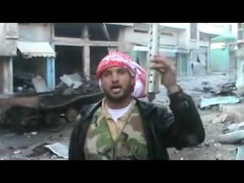 بيان يلقيه النقيب إياد الديك يتحدث عن العمليات العسكرية التي خاضها لواء خالد بن الوليد في مدينة الرستن